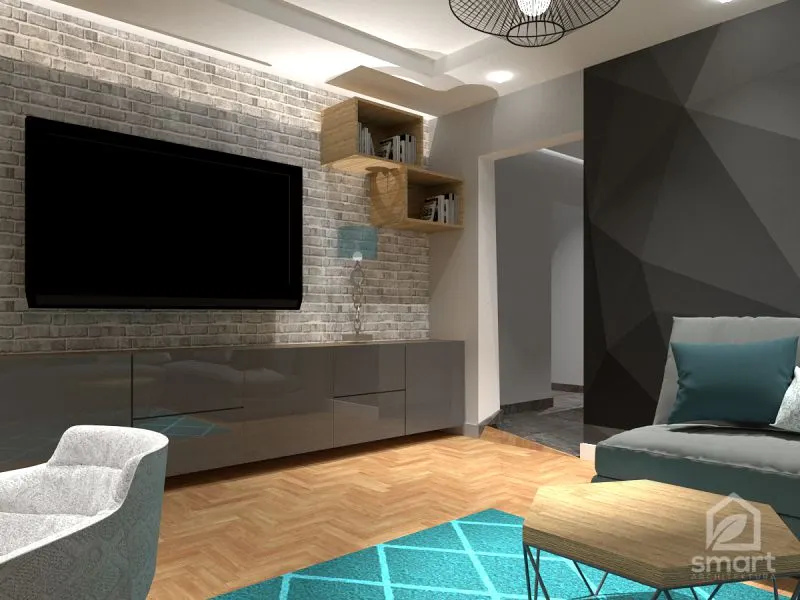 Salon z ceglaną ścianą telewizyjną, szarą szafką RTV i grafitową ścianą o geometrycznym wzorze