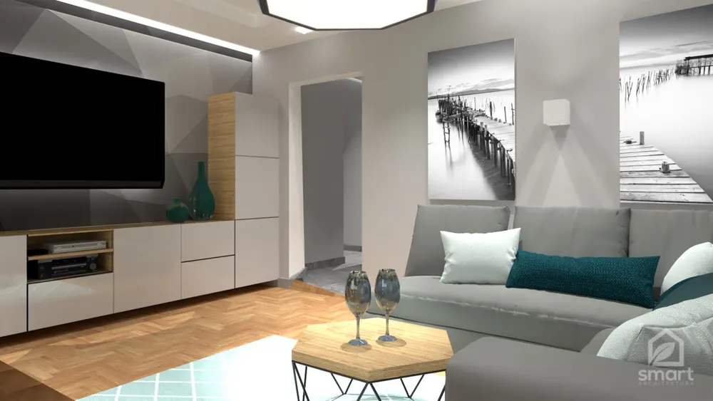 Salon z biało-drewnianą zabudową RTV, geometryczną ścianą i szarą sofą